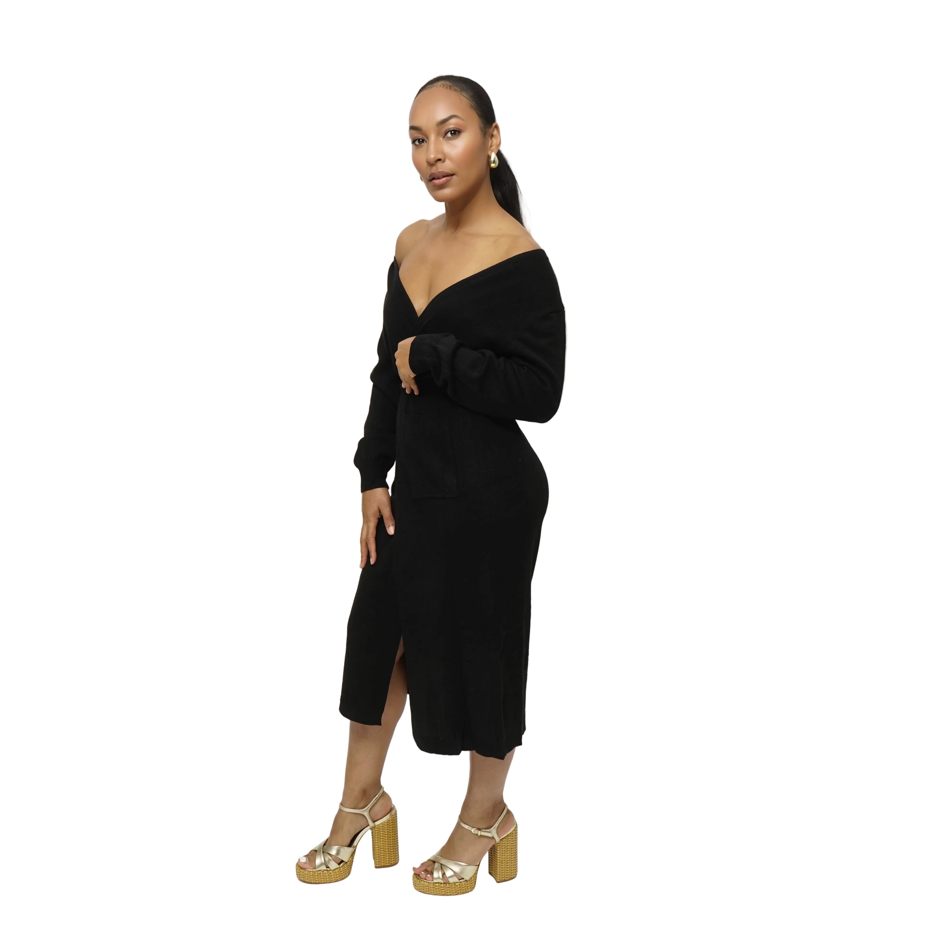 Woman wearing a black off-shoulder dress with a white background