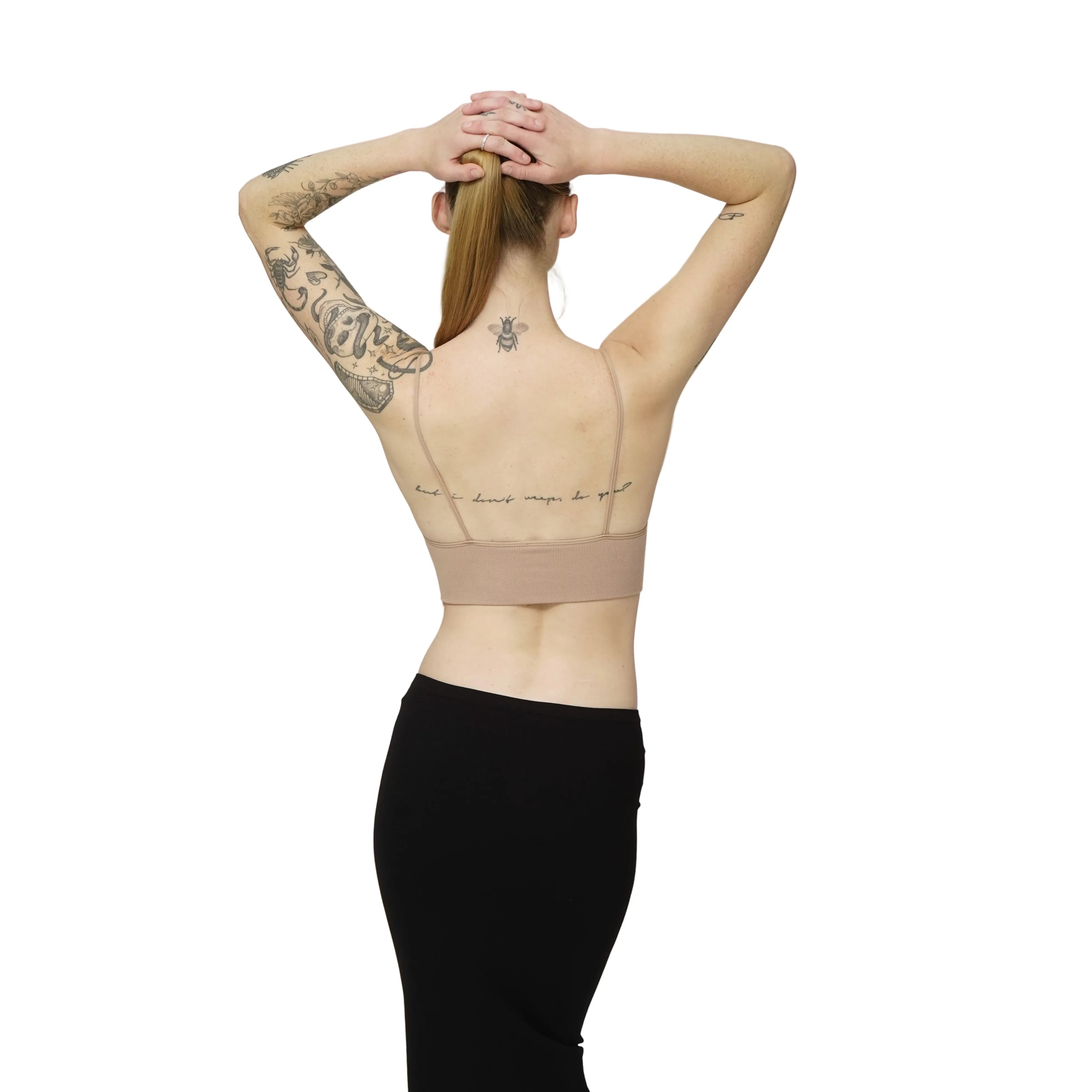 Person wearing a camel bralette