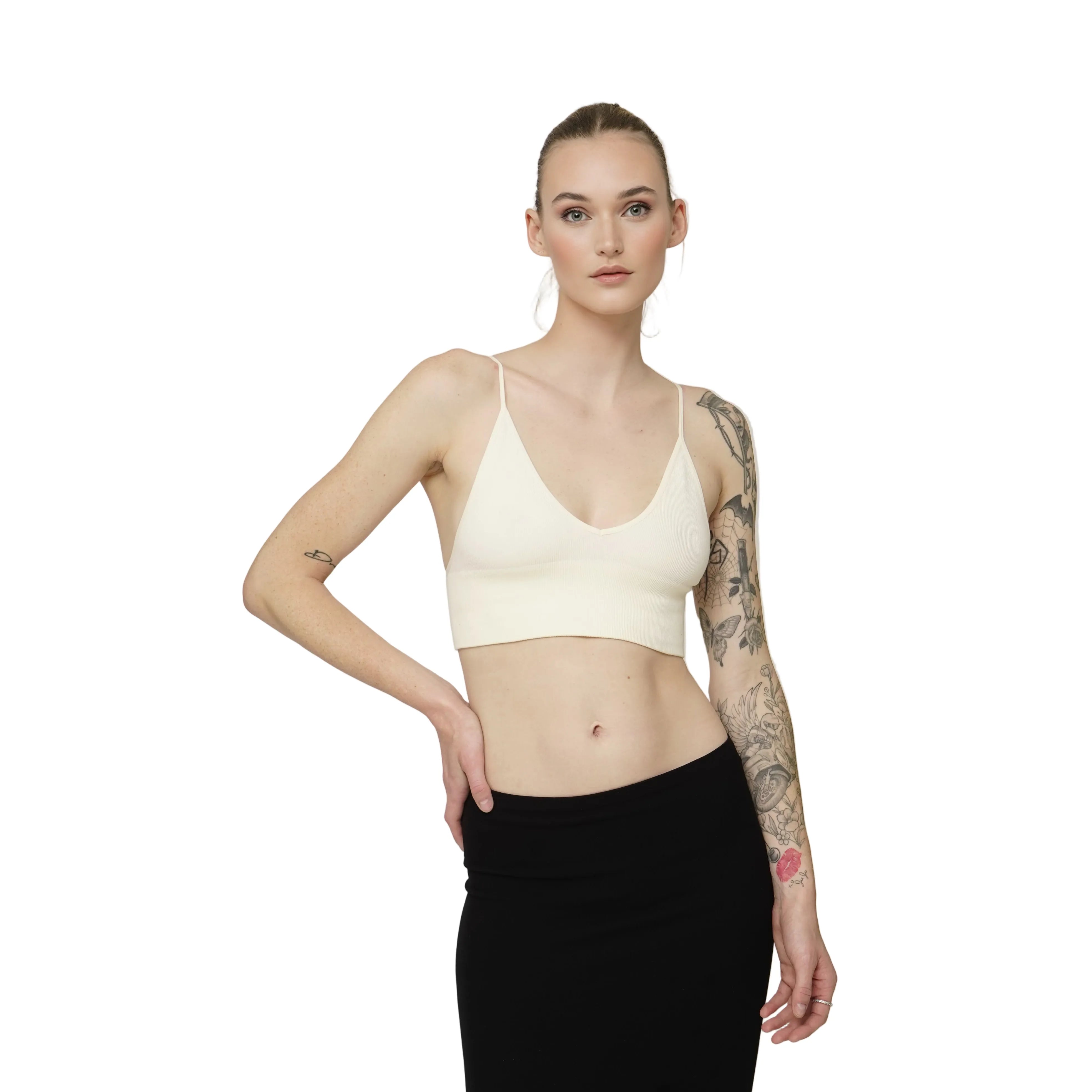 Woman wearing a beige bralette